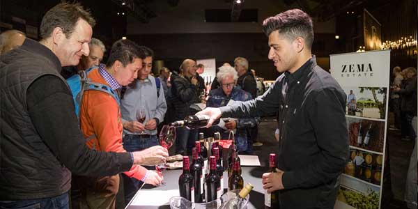 Demet Zema pouring wine at the Coonawarra Roadshow