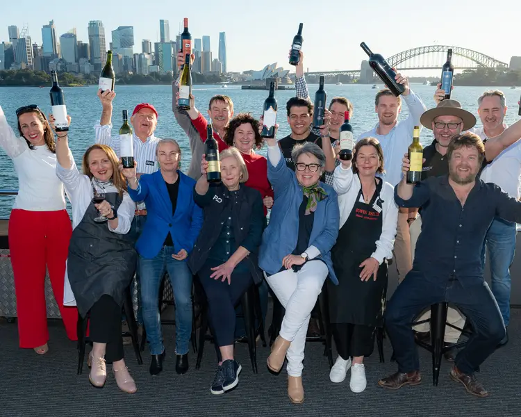 Coonawarra winemakers showcasing their wines in front of the Sydney Harbour Bridge during the Coonawarra Wine Tasting Roadshow.