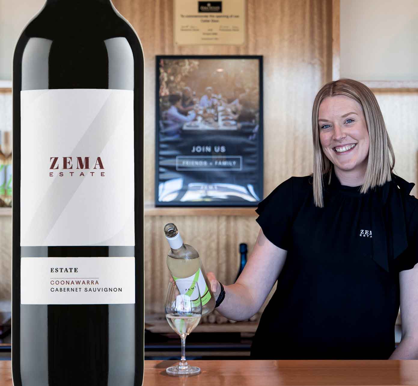 lady pours wine in cellar door winery