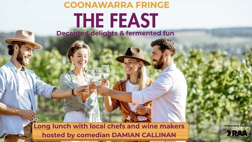 four young people cheers white wine in vineyard