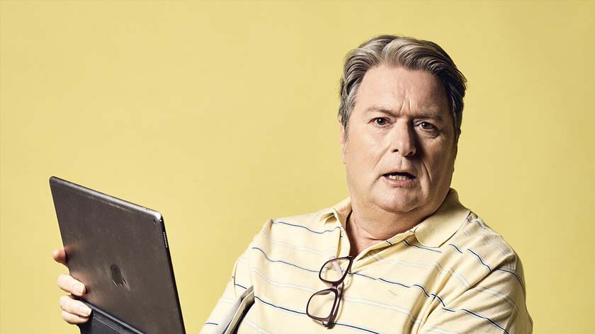 Dave O'Neil holds computer